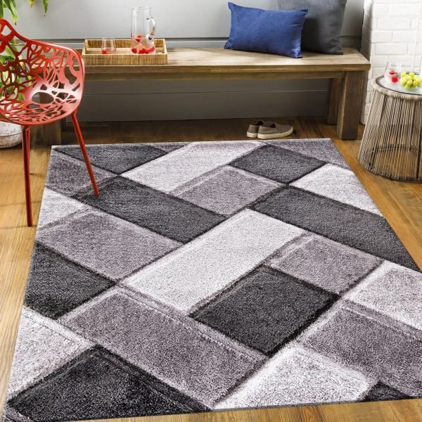 Orion geometric shaggy rug in Grey