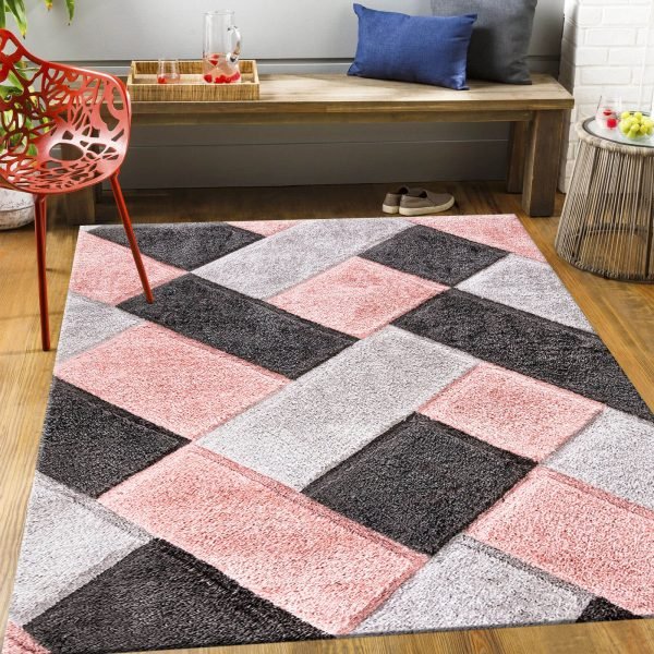Orion geometric shaggy rug in Pink