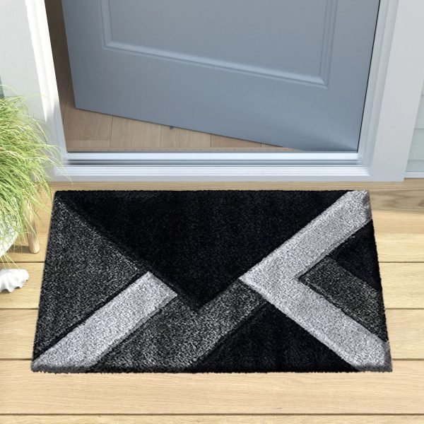 Nova geometric shaggy rug in Black Grey