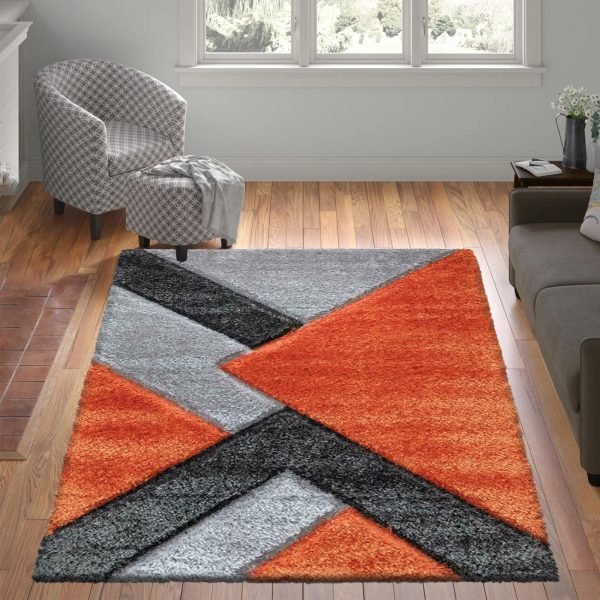Nova geometric shaggy rug in Orange Grey