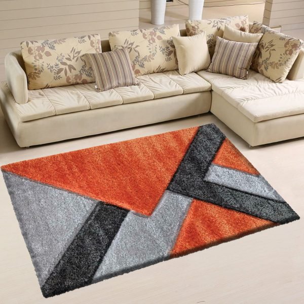 Nova geometric shaggy rug in Orange Grey