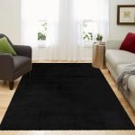 Yourk plain shaggy rug in Black