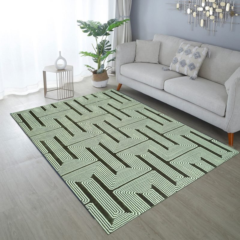 Luna pattern rug in green in a living room