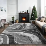 Gant Dark Grey abstract rug 240 x 320 cm, low pile with jute back and non-slip strip, in a room setting