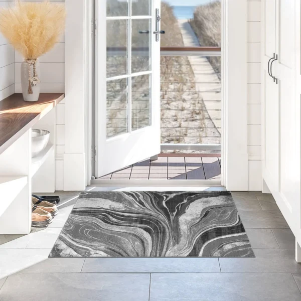 Gant Abstract Rug Dark Grey 60 x 110 cm Gant Dark Grey abstract rug 60 x 110 cm, low pile with jute back and non-slip strip, in a room setting