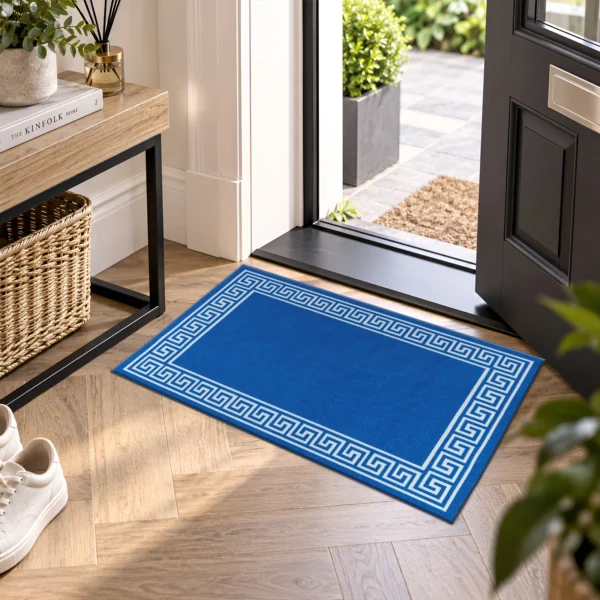 Greeky Blue Cream bordered rug 50 x 80 cm with Greek key border, low pile and non-slip backing, in a living room