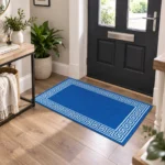 Greeky Blue Cream bordered rug 66 x 120 cm with Greek key border, low pile and non-slip backing, in a living room