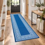 Greeky Blue Cream bordered rug 66 x 220 cm with Greek key border, low pile and non-slip backing, in a living room