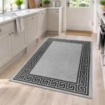 Greeky Grey Black bordered rug 120 x 170 cm with Greek key border, low pile and non-slip backing, in a living room