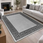 Greeky Grey Black bordered rug 160 x 230 cm with Greek key border, low pile and non-slip backing, in a living room
