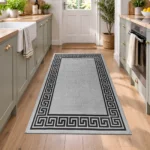 Greeky Grey Black bordered rug 80 x 150 cm with Greek key border, low pile and non-slip backing, in a living room