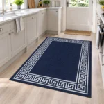 Greeky Navy bordered rug 120 x 170 cm with Greek key border, low pile and non-slip backing, in a living room