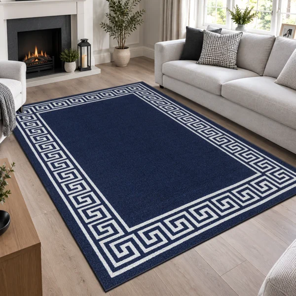 Greeky Navy bordered rug 160 x 230 cm with Greek key border, low pile and non-slip backing, in a living room