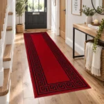 Greeky Red Black bordered rug 66 x 220 cm with Greek key border, low pile and non-slip backing, in a living room