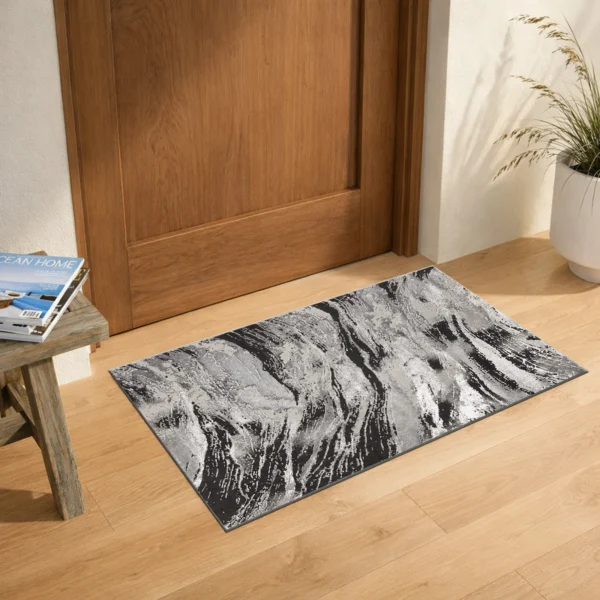 Jeze Abstract Rug Dark Grey 60 x 110 cm Jeze Dark Grey abstract rug 60 x 110 cm, medium pile with jute backing, in a living room