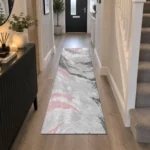 Jeze Pink abstract rug 60 x 220 cm, medium pile with jute backing, in a living room