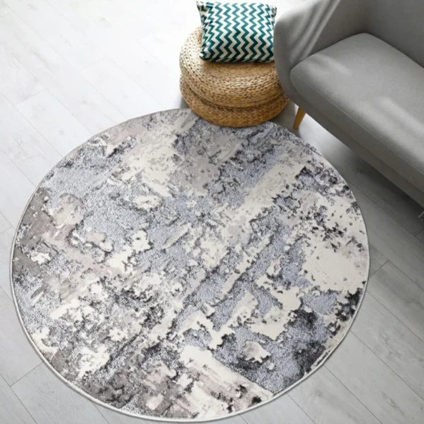 Grey modern abstract rug 120 x 120 cm, low pile with jute backing, in a living room