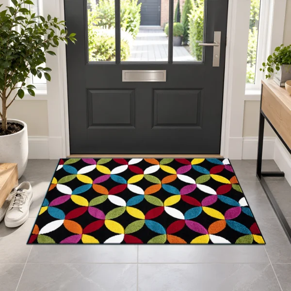 Multi Colour Rug Circles Black 60 x 110 cm Multi Circles Black multicolour geometric rug 60 x 110 cm, medium pile with jute backing, in a living room