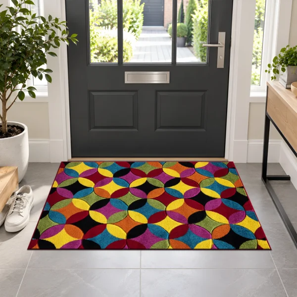 Multi Colour Rug Circles Bright 60 x 110 cm Multi Circles Bright multicolour geometric rug 60 x 110 cm, medium pile with jute backing, in a living room