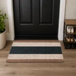 Nada Beige Black geometric rug 60 x 110 cm, low pile with non-slip gel back, in a room setting