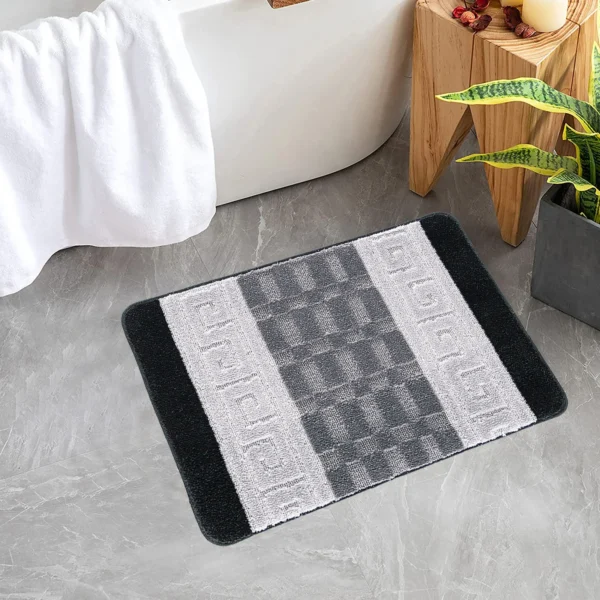 Nada Geometric Rug Black Grey 40 x 60 cm Nada Black Grey geometric rug 40 x 60 cm, low pile with non-slip gel back, in a room setting
