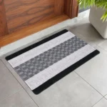 Nada Black Grey geometric rug 50 x 80 cm, low pile with non-slip gel back, in a room setting