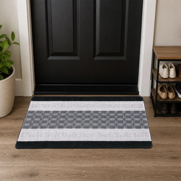 Nada Geometric Rug Black Grey 60 x 110 cm Nada Black Grey geometric rug 60 x 110 cm, low pile with non-slip gel back, in a room setting