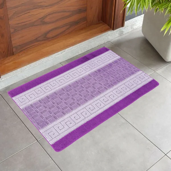 Nada Geometric Rug Purple 50 x 80 cm Nada Purple geometric rug 50 x 80 cm, low pile with non-slip gel back, in a room setting