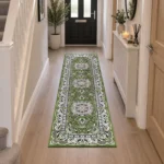 Rada Green traditional floral rug 60 x 220 cm, medium pile with jute backing, in a living room