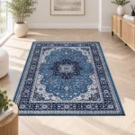 Rome Blue traditional floral rug 120 x 170 cm, medium pile with jute backing, in a living room